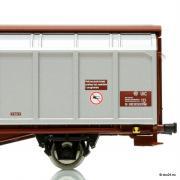 Wagon towarowy z przesuwanymi ścianami Hbbillns (Roco 66577)